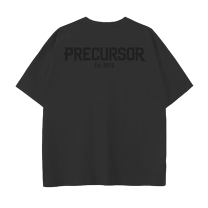 Black t-shirt with 'PRECURSOR Est. 2025' text on the back against a white background